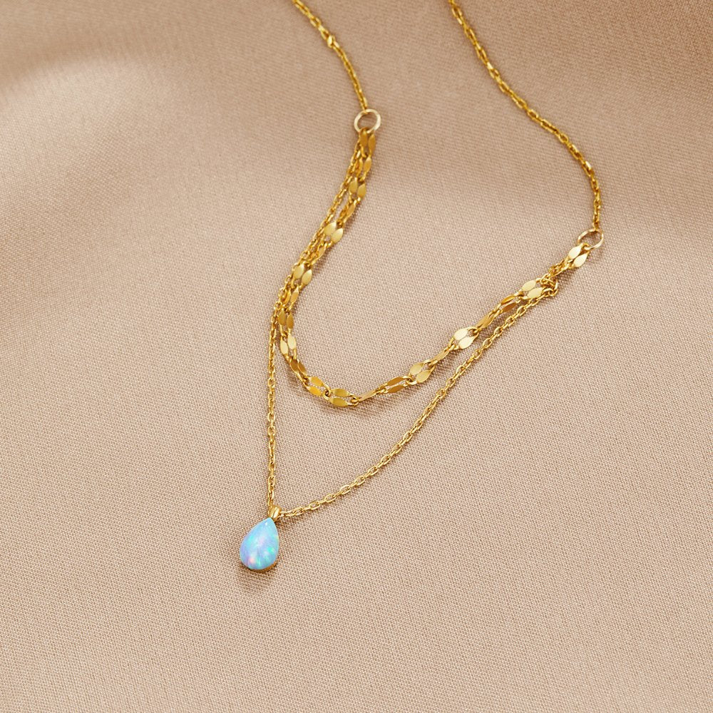 Collar en capas con una gota de ópalo azul