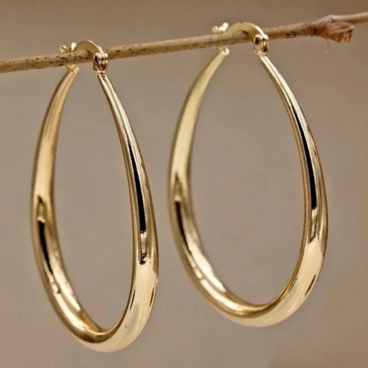 Pendientes elegantes de oro
