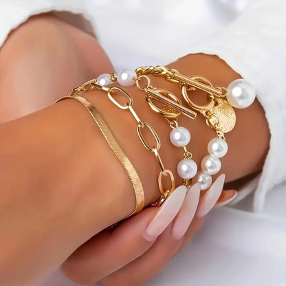 Conjunto de pulseras elegantes en oro (4 piezas): serpiente, perlas y eslabones