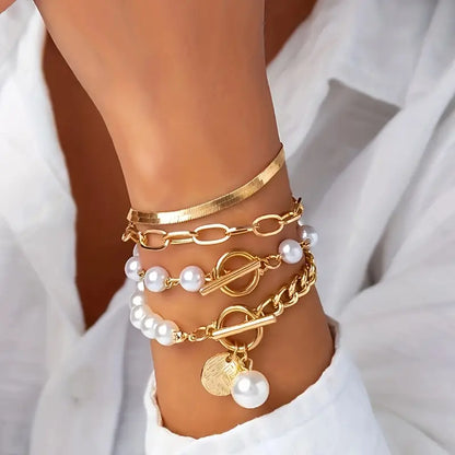 Conjunto de pulseras elegantes en oro (4 piezas): serpiente, perlas y eslabones