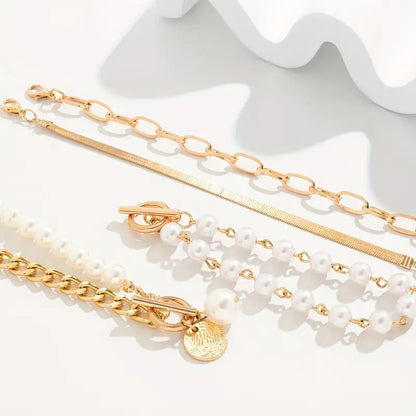 Conjunto de pulseras elegantes en oro (4 piezas): serpiente, perlas y eslabones