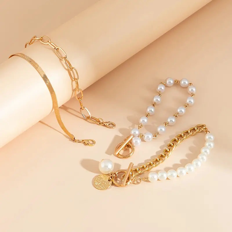 Conjunto de pulseras elegantes en oro (4 piezas): serpiente, perlas y eslabones