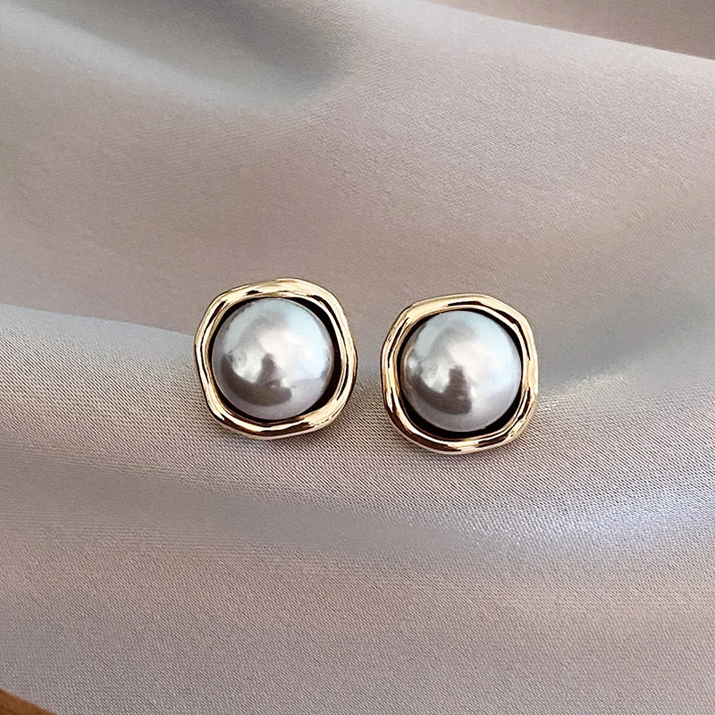 Pendientes vintage elegantes con perlas