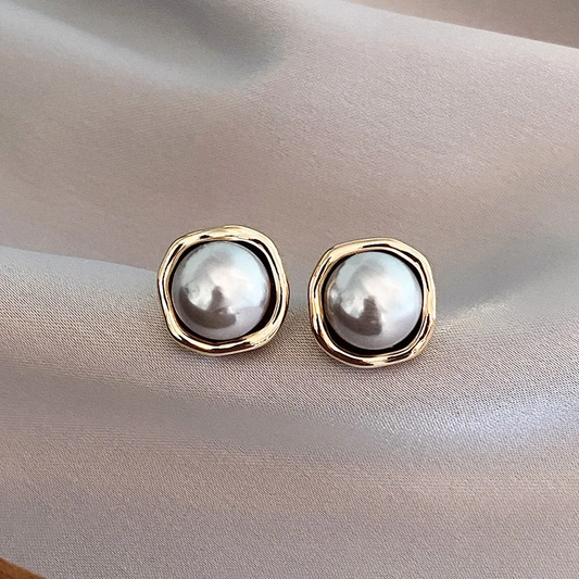 Pendientes vintage elegantes con perlas